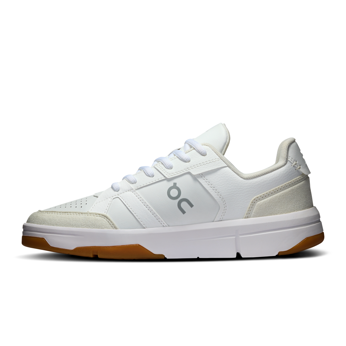 On women's white and ivory low-top sneakers with lace-up and side panel detail