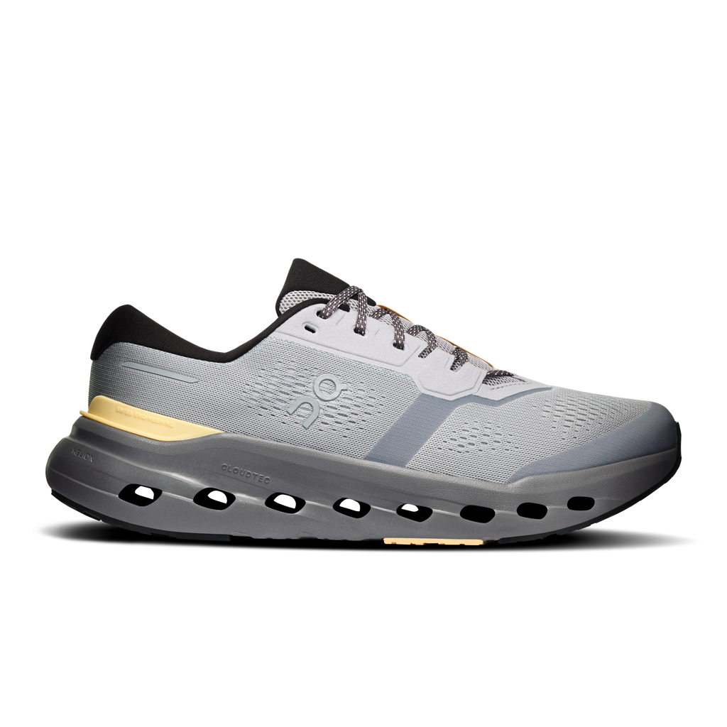 Men's running shoes, light gray with gold accent midsole and black Cloud-style pods
