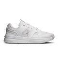 On women's running shoes in white with lace-up front and side logo details