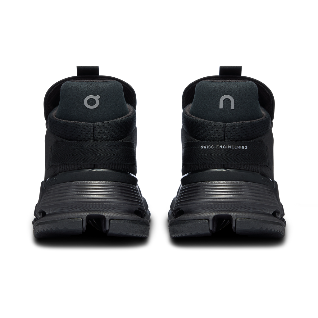 Men's black running shoes, heel view with SWISS ENGINEERING branding