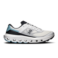 Men's running shoes in ivory with black lining and blue accents, lace-up side view