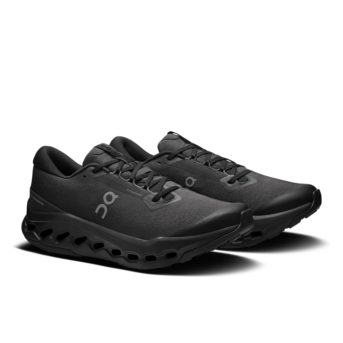 Men's black waterproof trail running shoes, front 3/4 view, lace-up with On logo