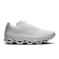 Women's white running shoes with textured mesh upper and strap lacing