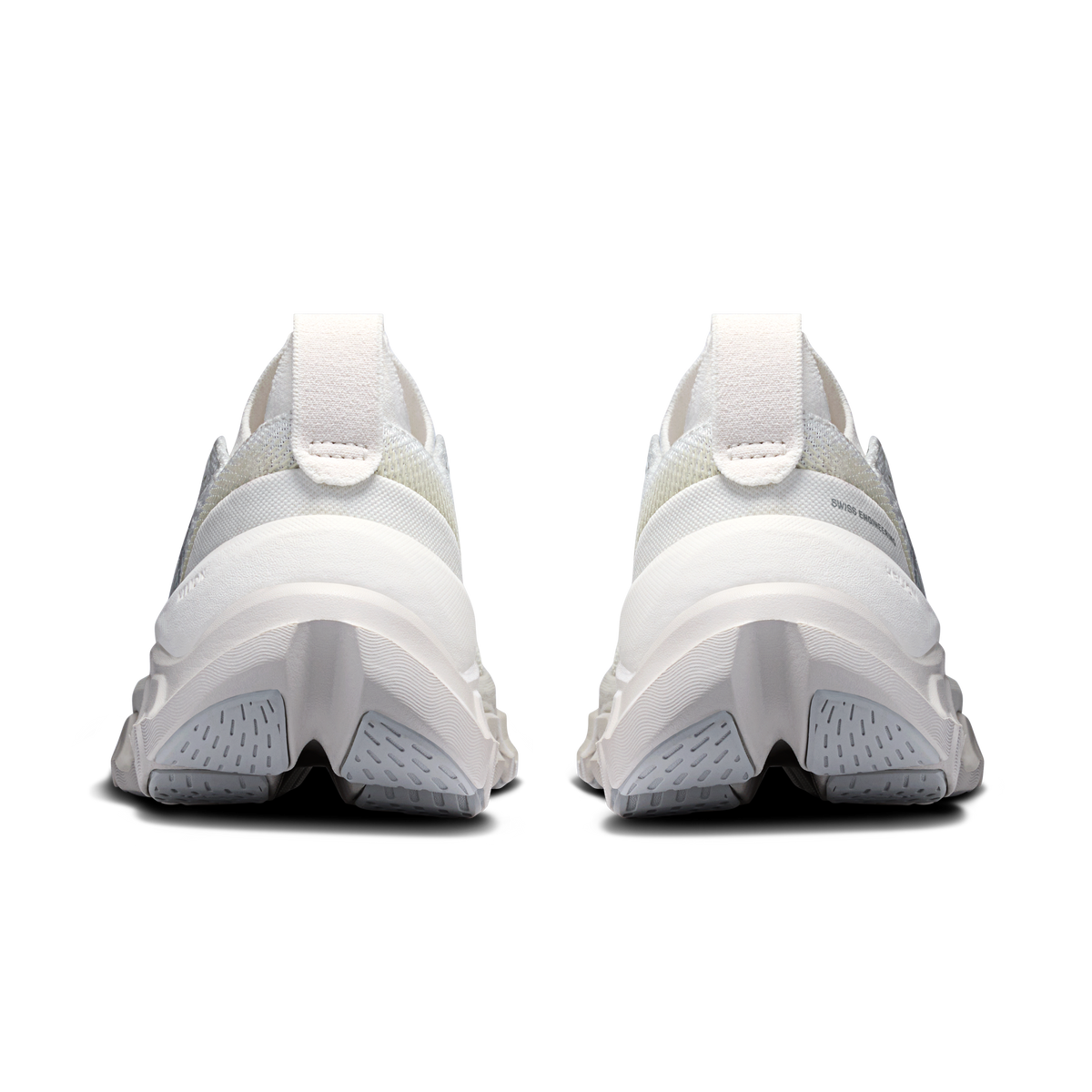 Women's running shoes heel view, padded collar with white outsole and tread