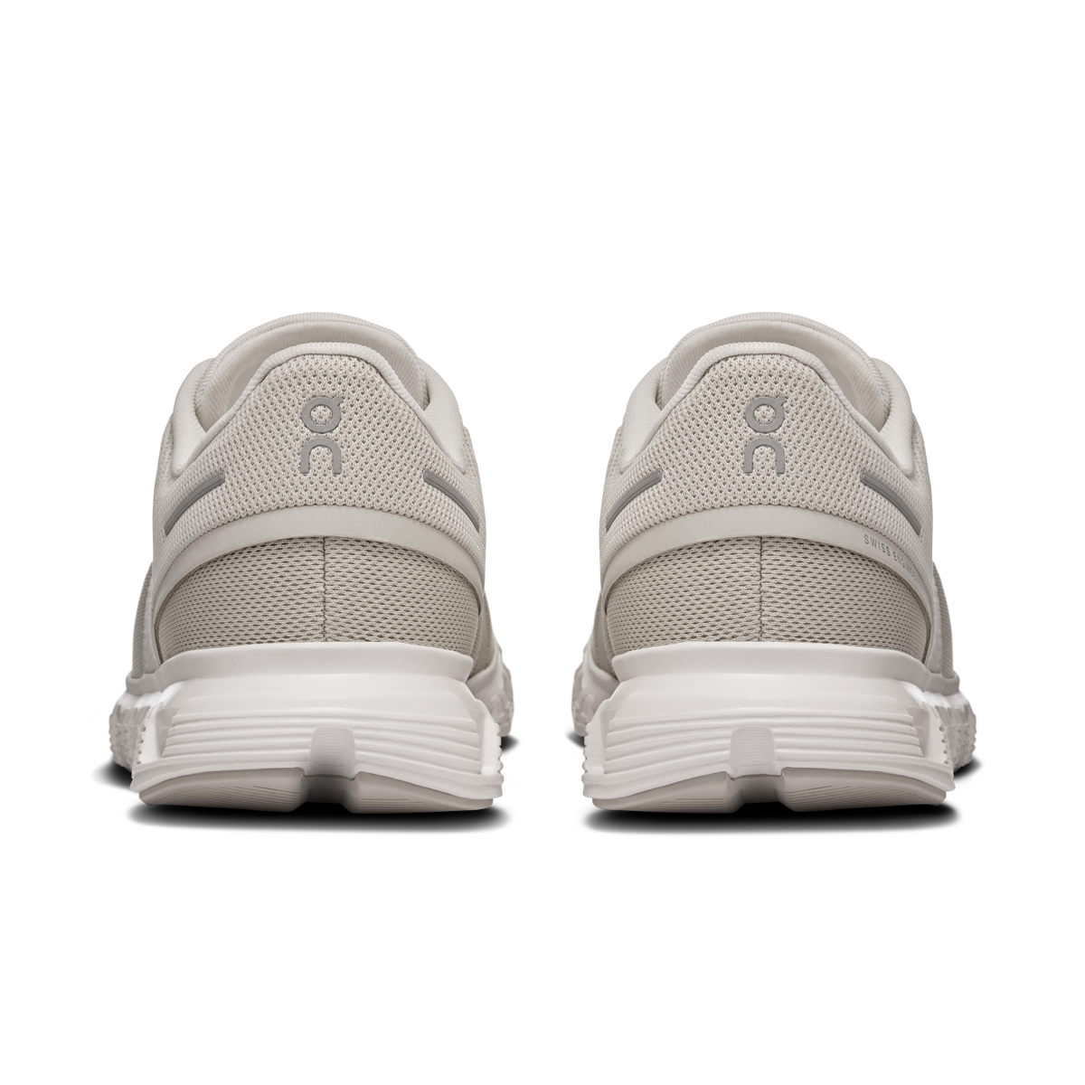 Women's pearl and white sneakers, rear view with cushioned heel and pull tab.