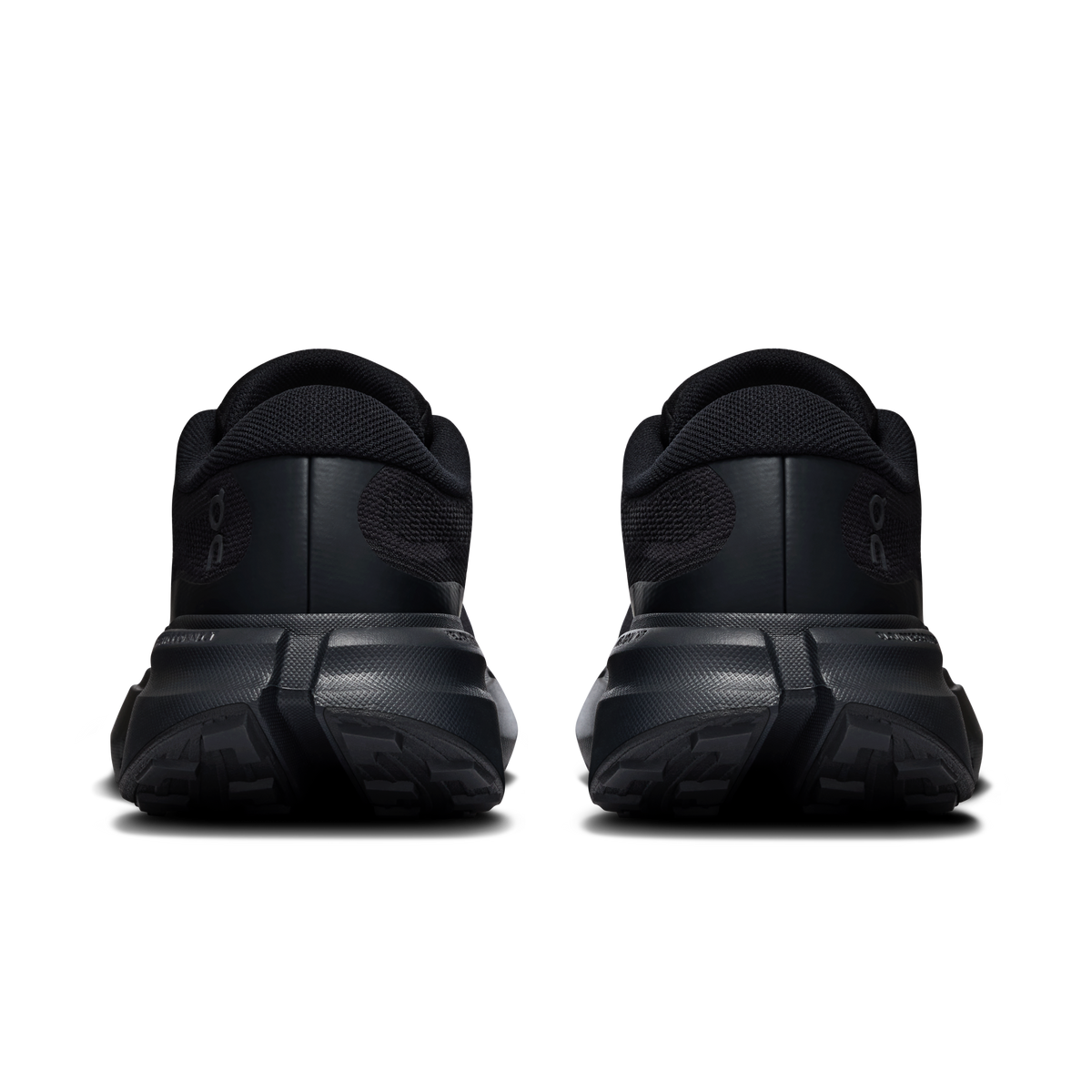 Black back view hiking shoes with padded collar and grippy treaded sole
