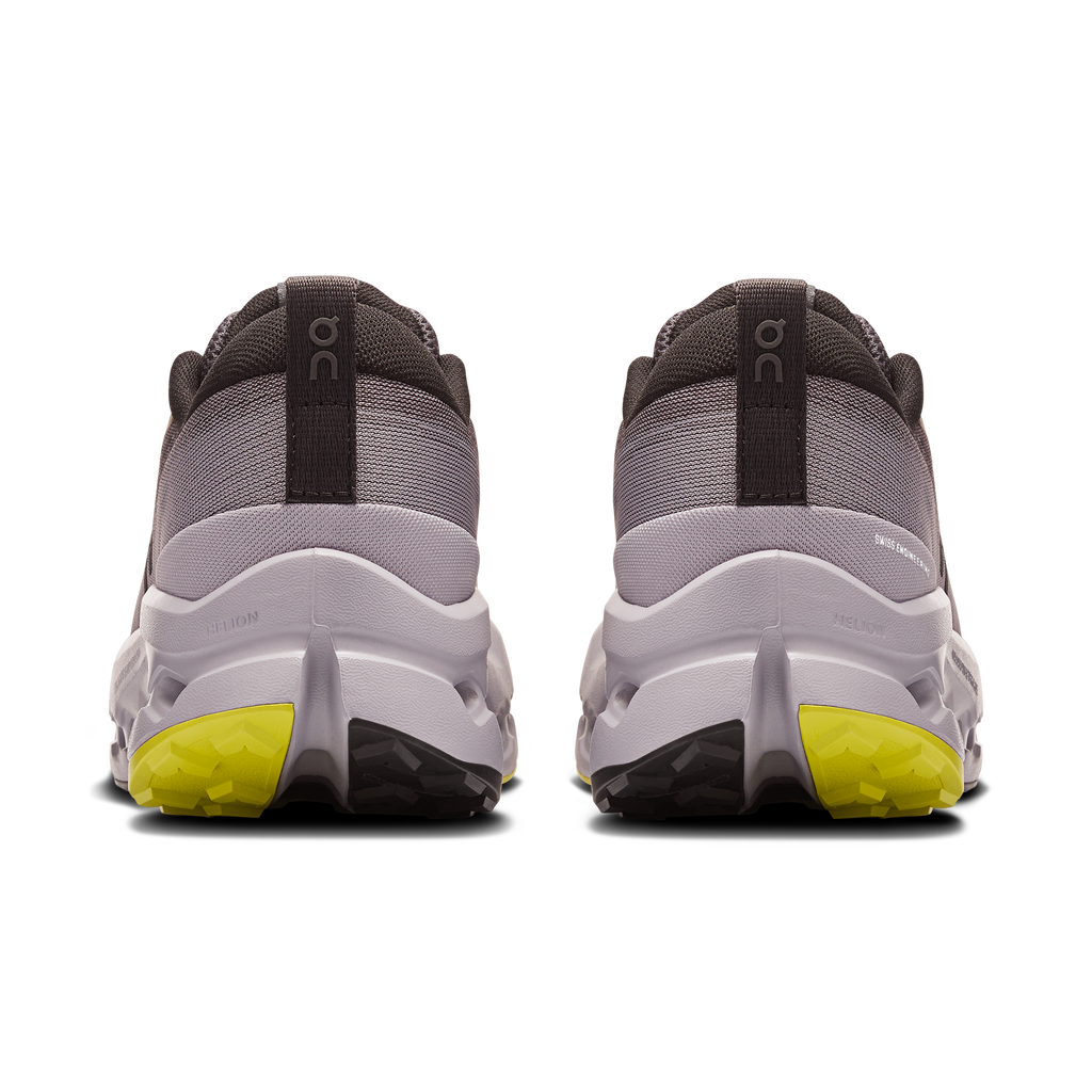 Women's trail running shoes heel view, gray upper with white cushioning and yellow outsole