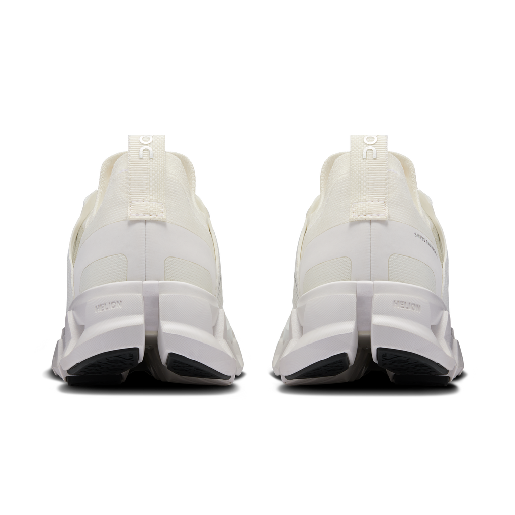 Back view of white women's running shoes with heel loop and CloudTec sole