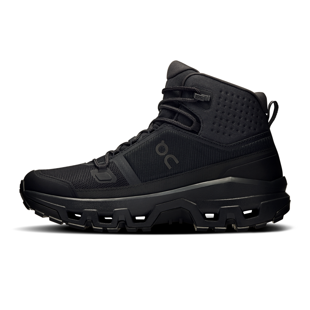 Black mid waterproof hiking shoe with side overlays and ankle strap detail