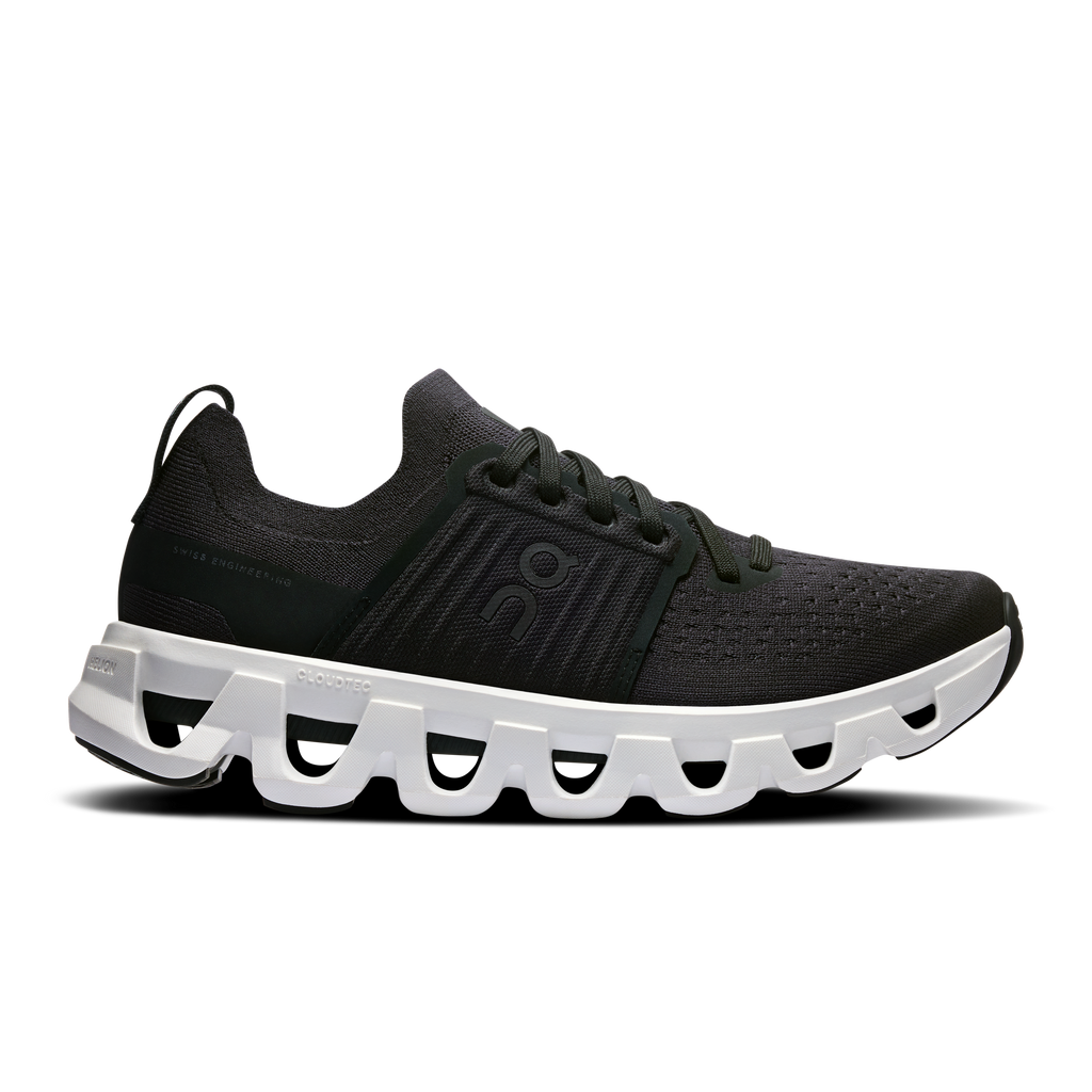 Women's running shoes, black knit upper with lace-up and white cushioned sole