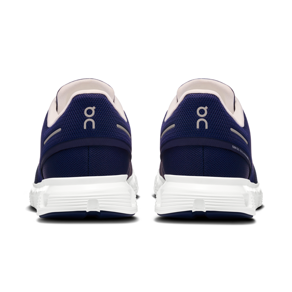 Men's navy running shoes with white heel detailing and On logo