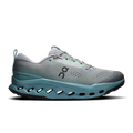 Men's trail running shoes, light gray mesh with teal midsoles and neon green accents.