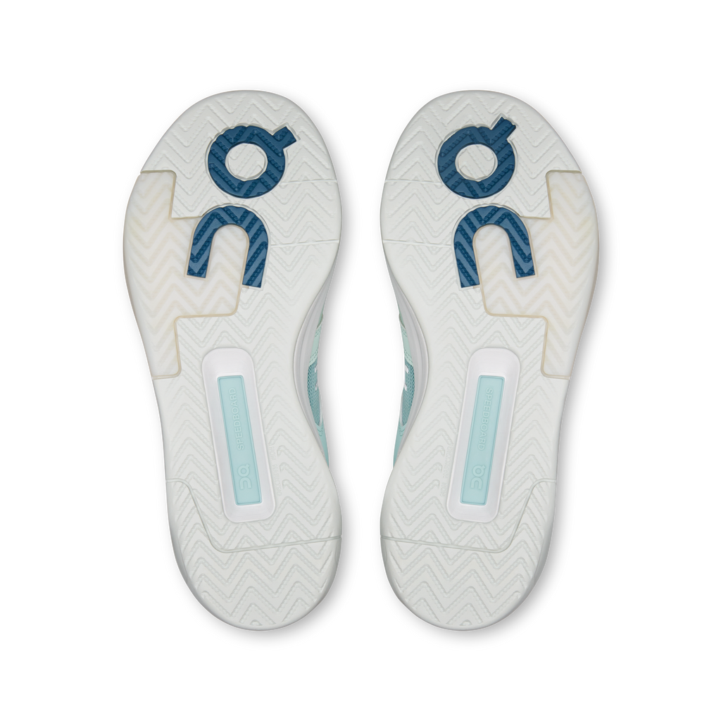 Pair of shoe outsoles with geometric tread and On logo