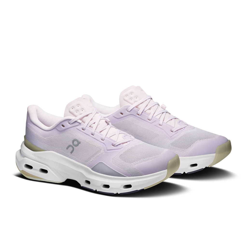 Women's light purple lace-up running shoes with On logo and white cushioning sole