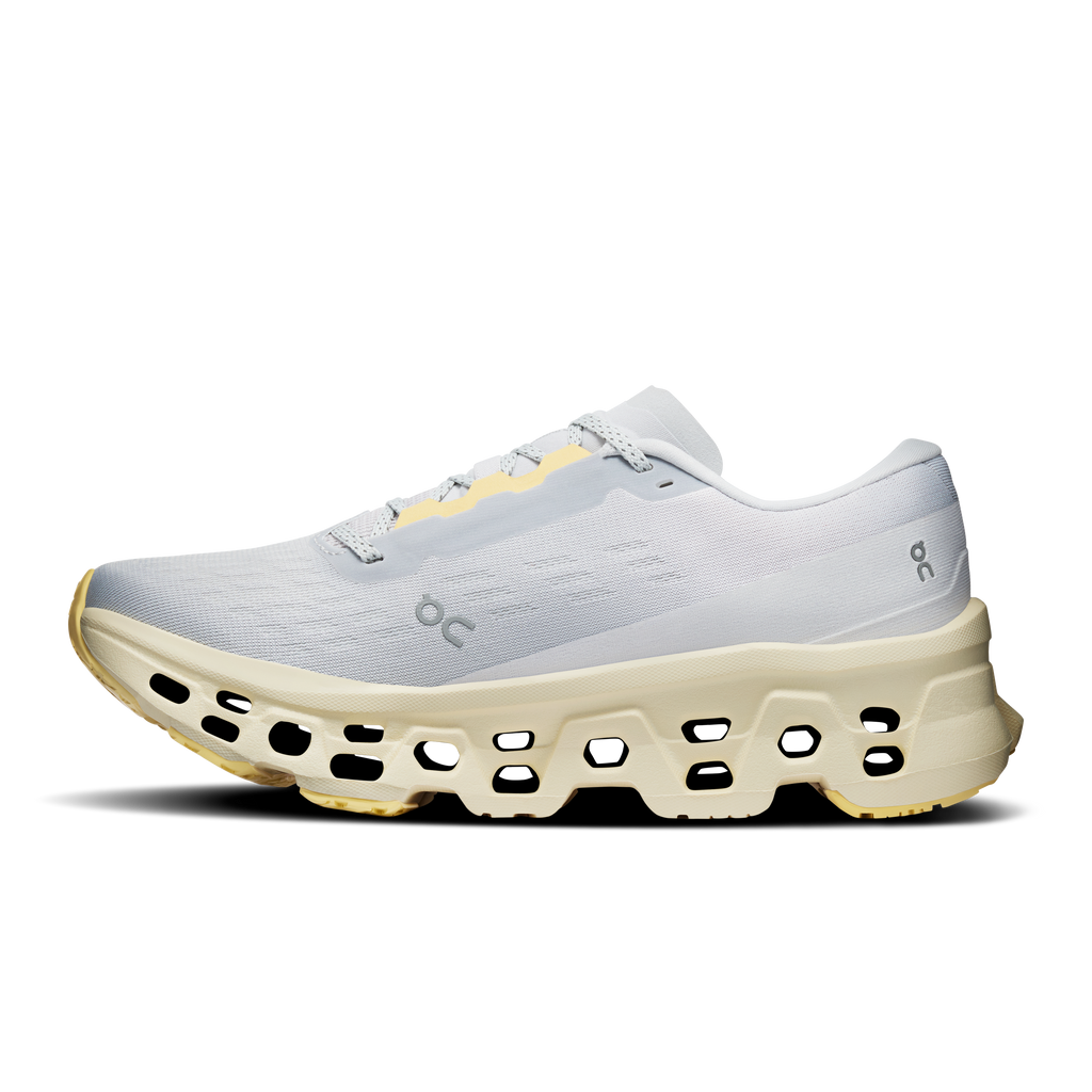 Light gray On running shoe with white laces and chunky yellow platform sole