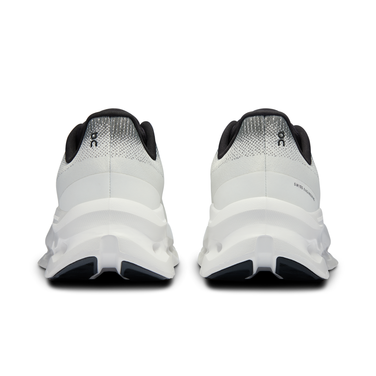 Cloudtilt running shoes with black heel trim and light gray knit on white sole