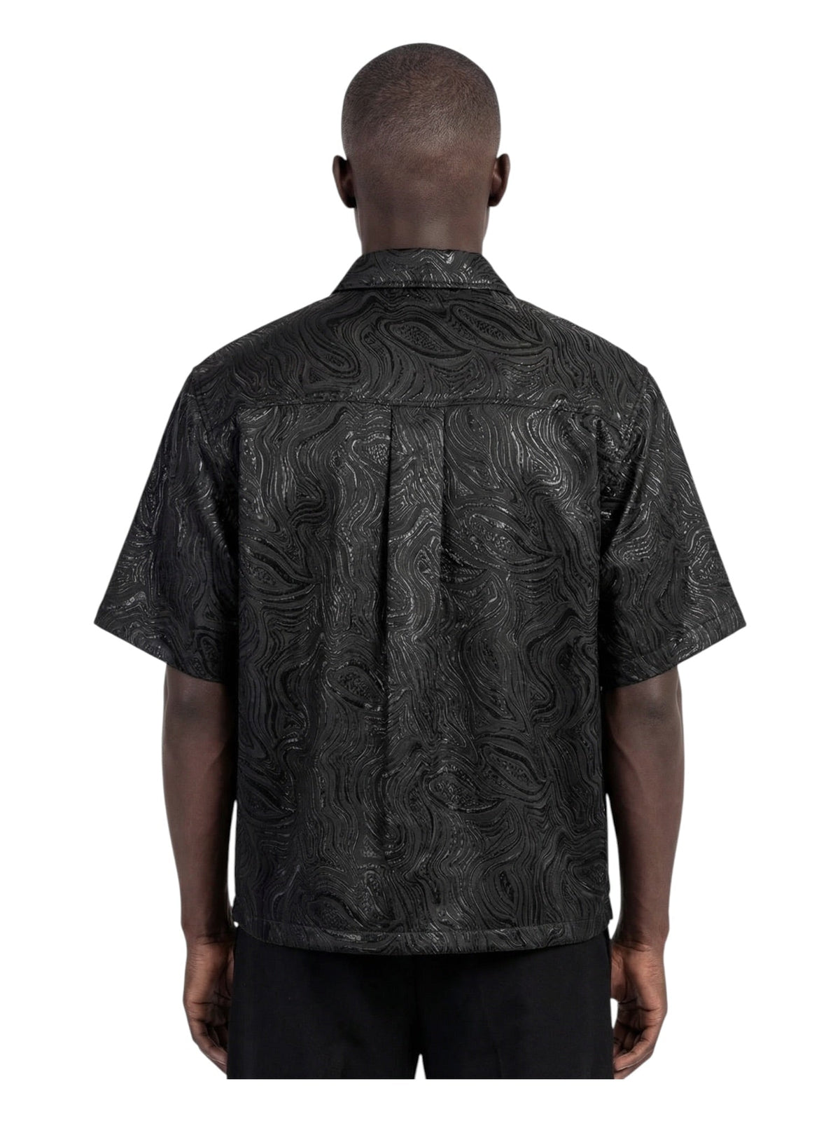 Men's black short-sleeve button-up shirt with wavy texture print, back view