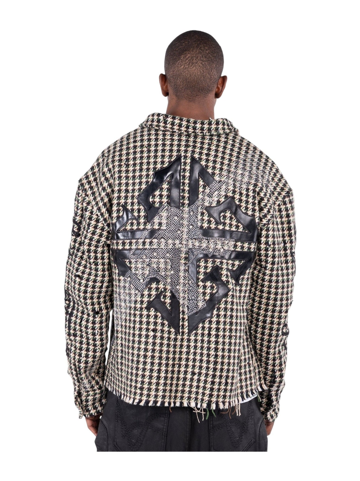 Men’s back view houndstooth shirt with large black graphic patch across shoulders