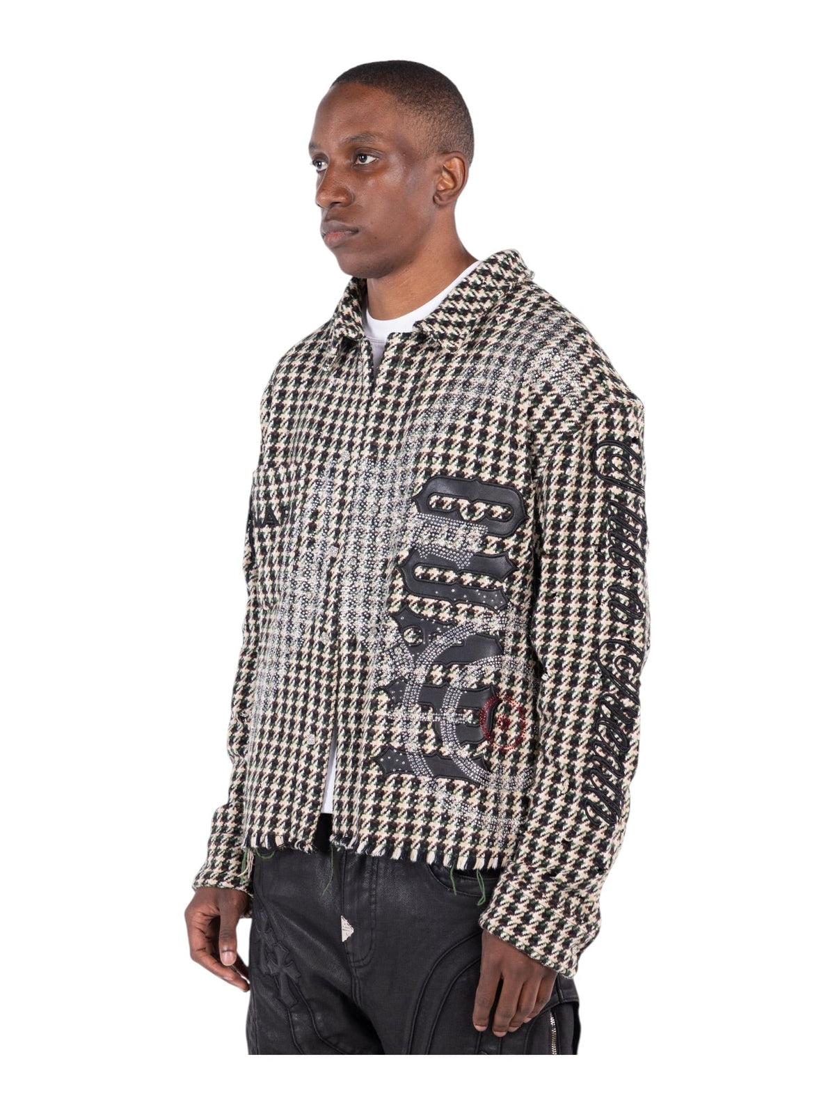 Men’s side view houndstooth button-up shirt with front black graphic patch