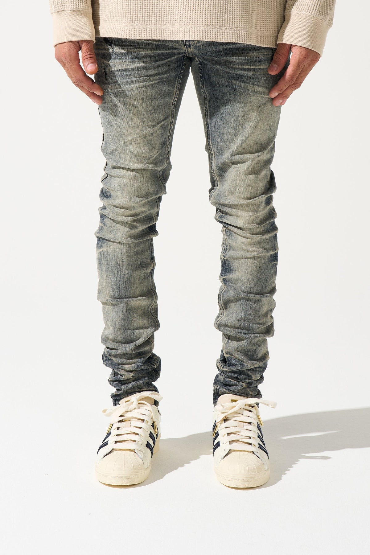 Men's gunmetal-wash slim jeans, front view, stacked fading and ruched ankle cuffs