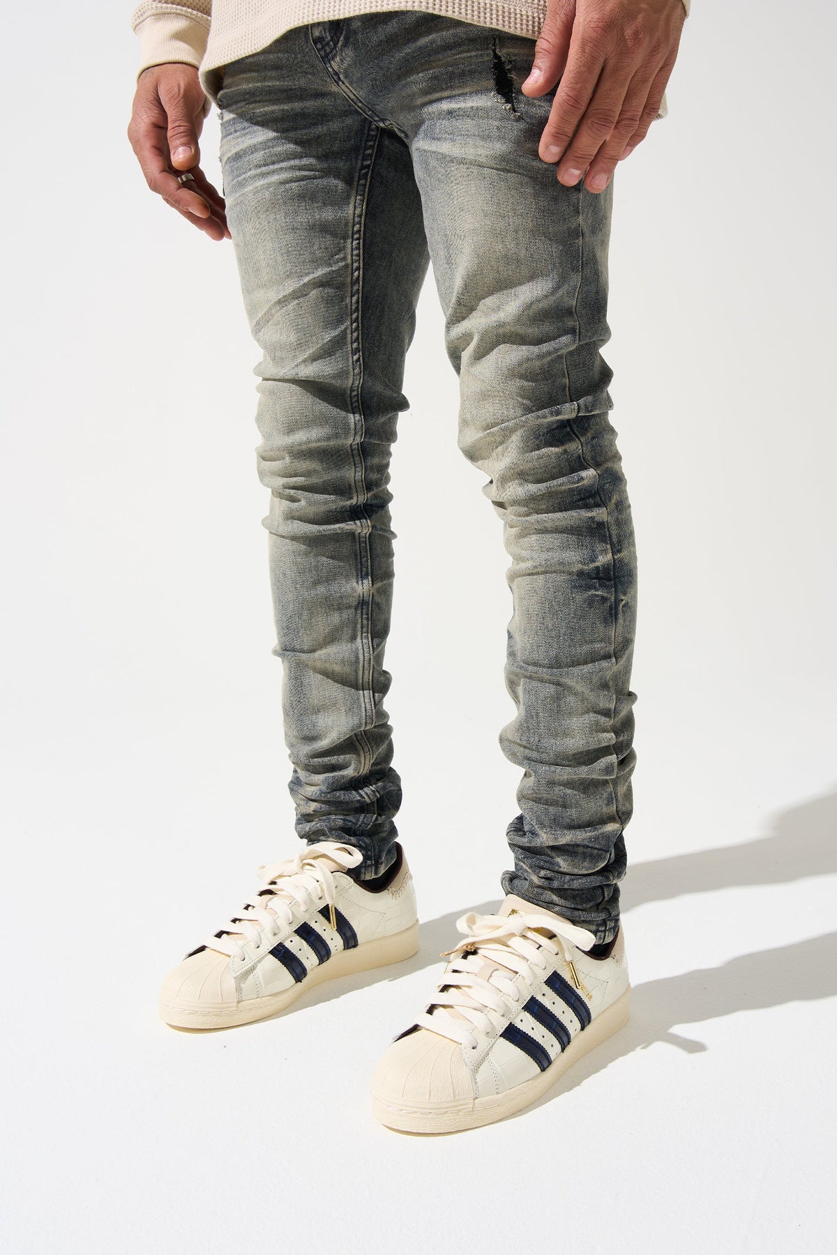 Men's gunmetal-wash slim jeans with faded panels and ruched ankle cuffs