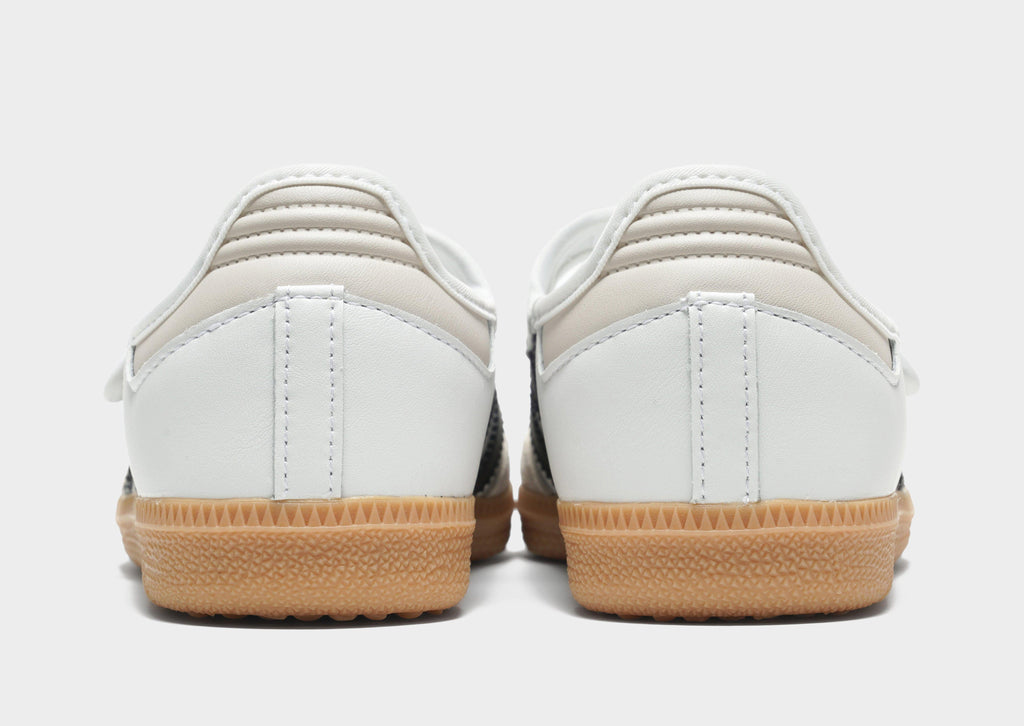 Kids' Samba Jane sneakers back view with white heel tabs and gum outsole