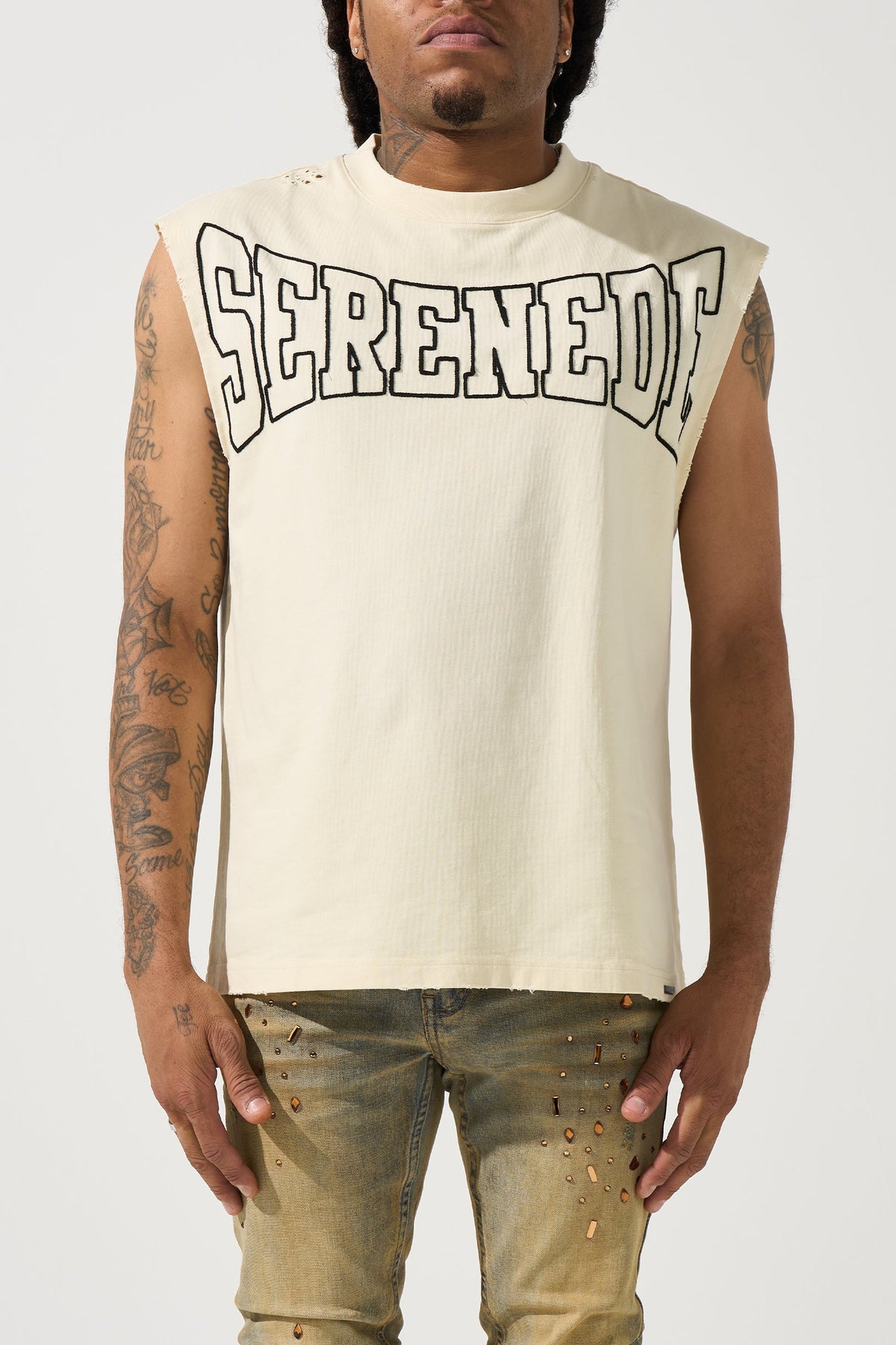 Men's ivory sleeveless tank with SERENED logo print and crew neckline