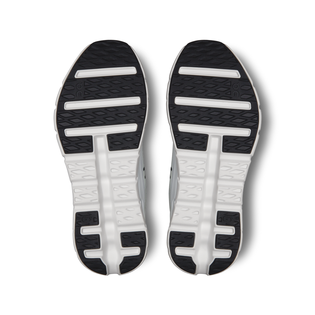 Cloudtilt shoe outsoles with textured tread in black and white
