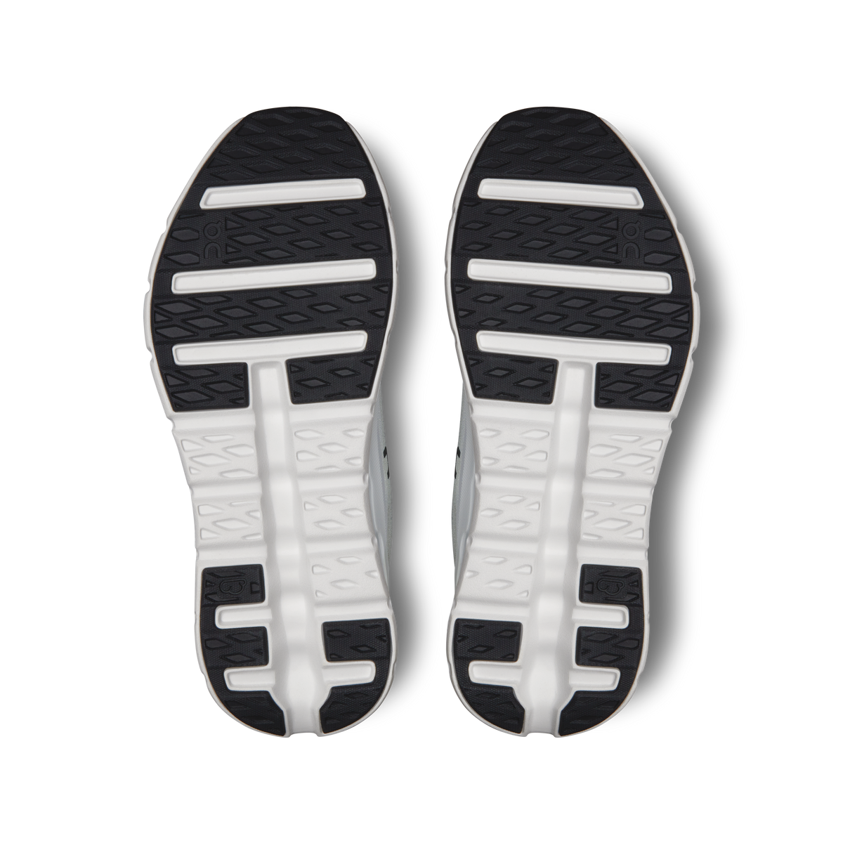 Cloudtilt shoe outsoles with textured tread in black and white