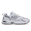 White New Balance 530 lace-up sneakers with navy accents, mesh upper and N logo