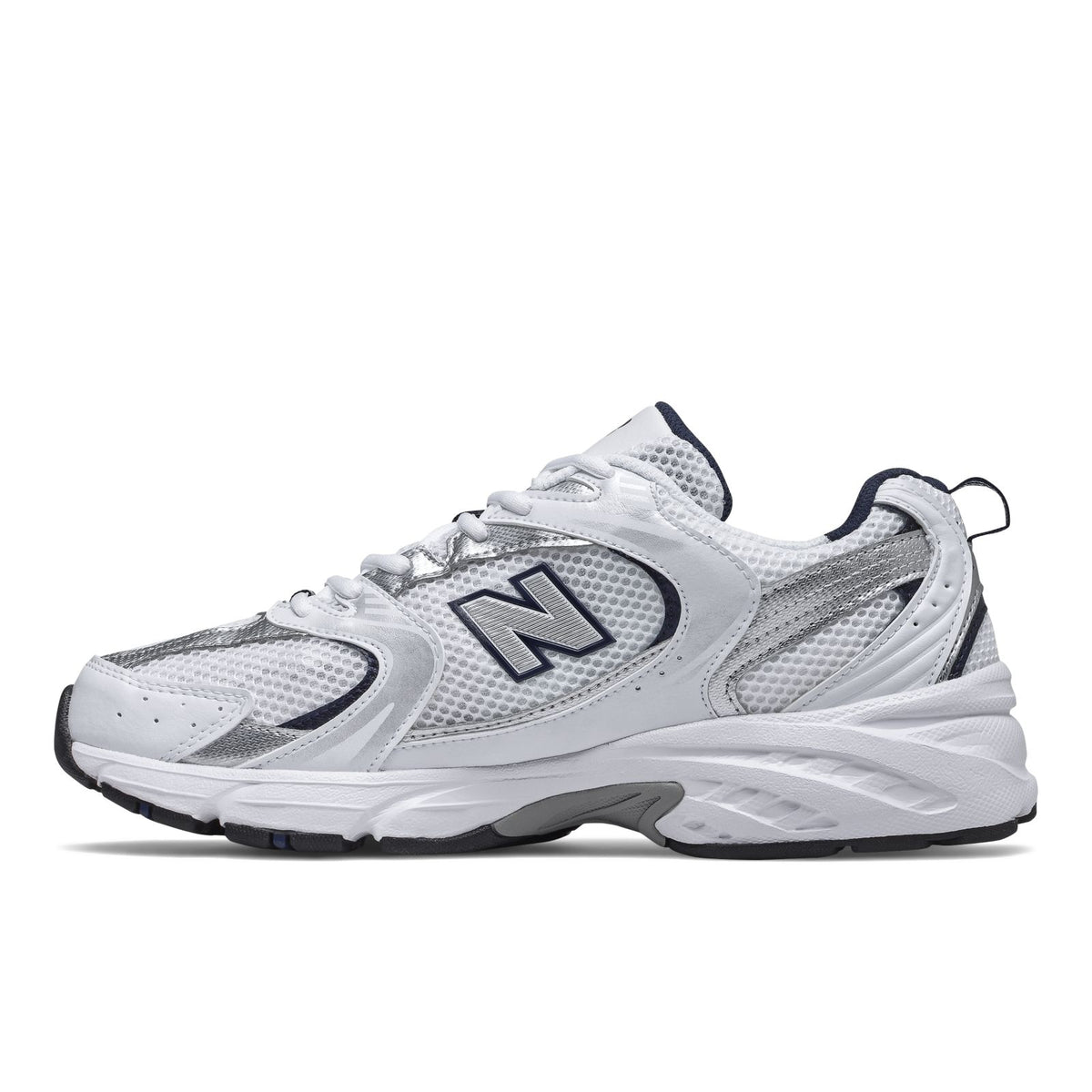 White New Balance 530 running sneakers, side profile with large N logo and navy heel trim