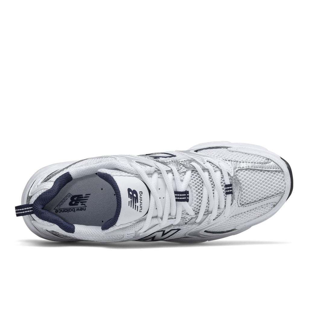 White New Balance 530 sneaker with visible laces and cushioned navy-and-white collar