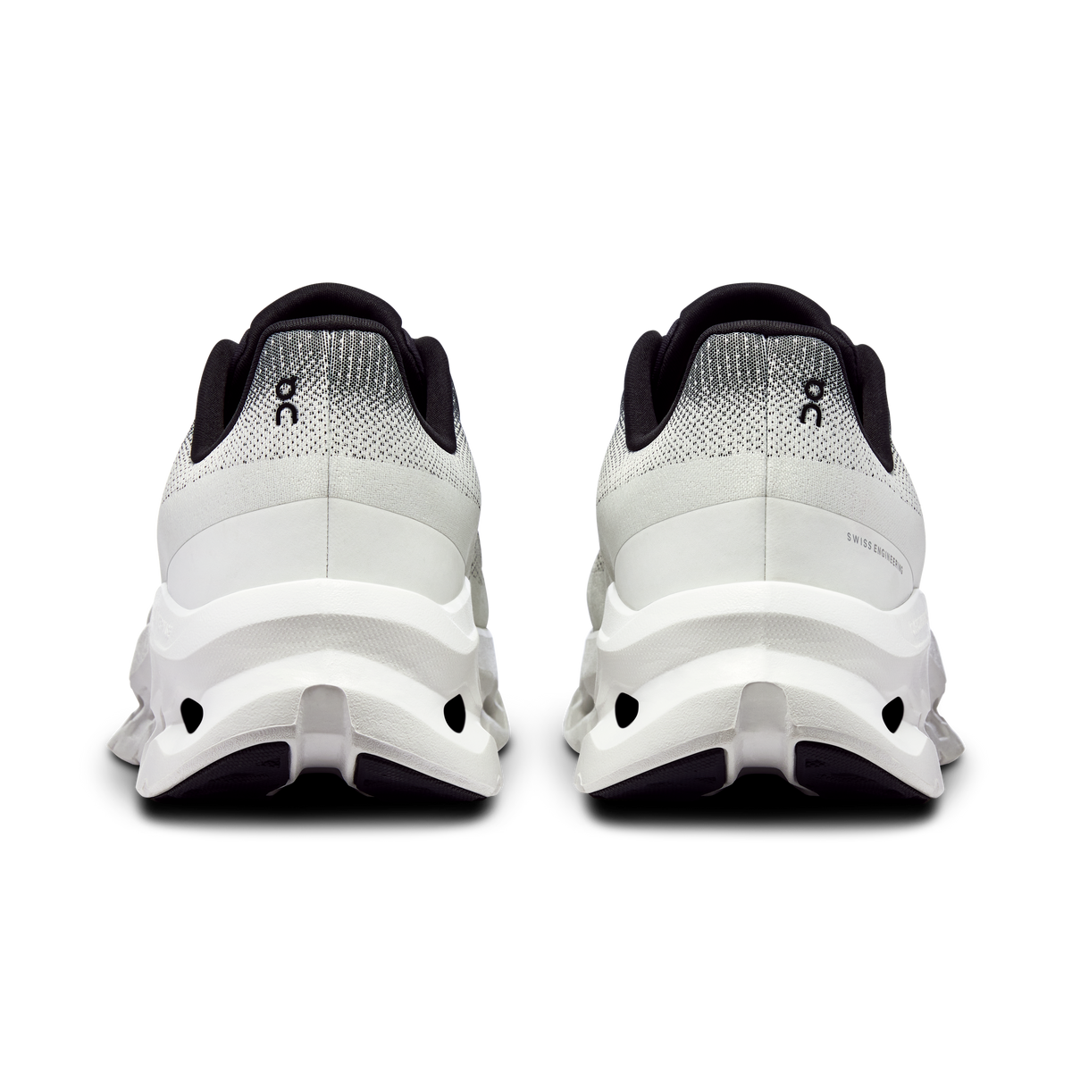 Men's Cloudtilt shoes, rear view with black collar and ivory knit upper, cushioned heel