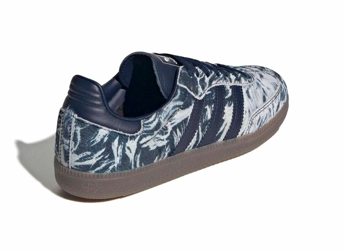 Adidas Samba OG pony hair sneakers, side view in dark blue and off-white