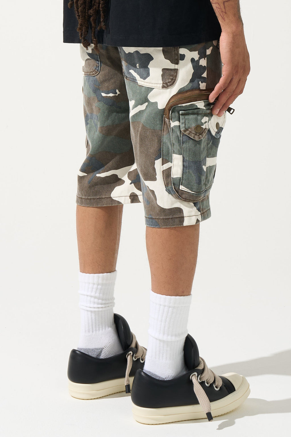 Men's camo cargo shorts with front cargo pocket and side detail, knee-length