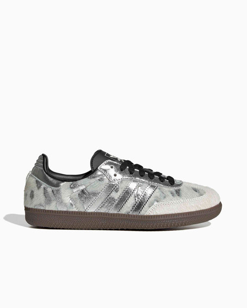 Adidas Samba OG shoes with metallic silver pony-hair upper, black laces, gum sole