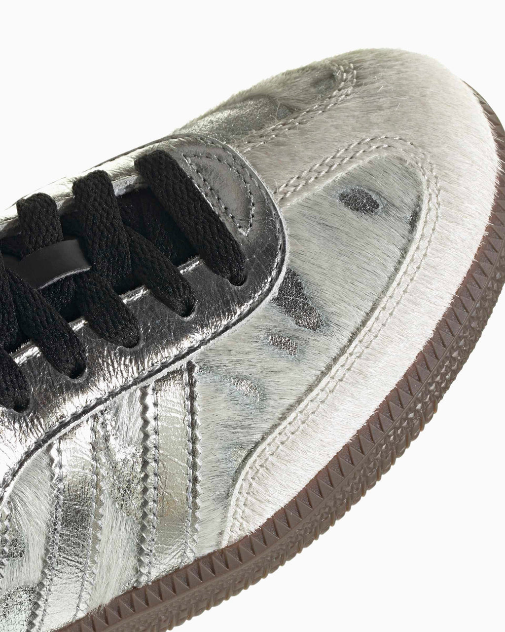 Adidas Samba OG side detail: silver pony-hair leather, black laces, textured stitching