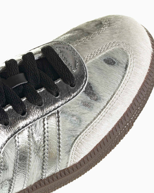 Adidas Samba OG side detail: silver pony-hair leather, black laces, textured stitching
