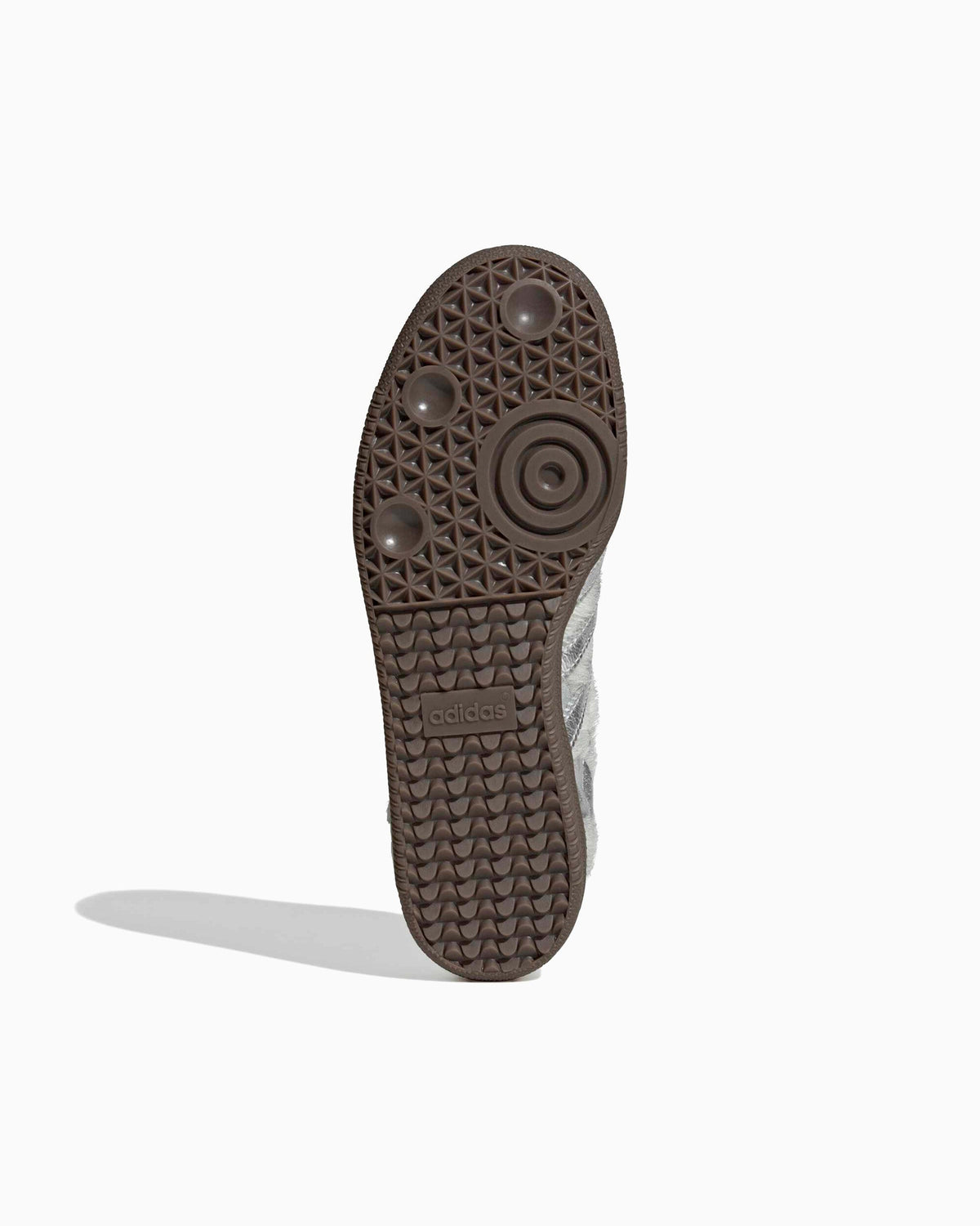 Adidas Samba OG outsole with brown gum tread pattern and circular traction detail