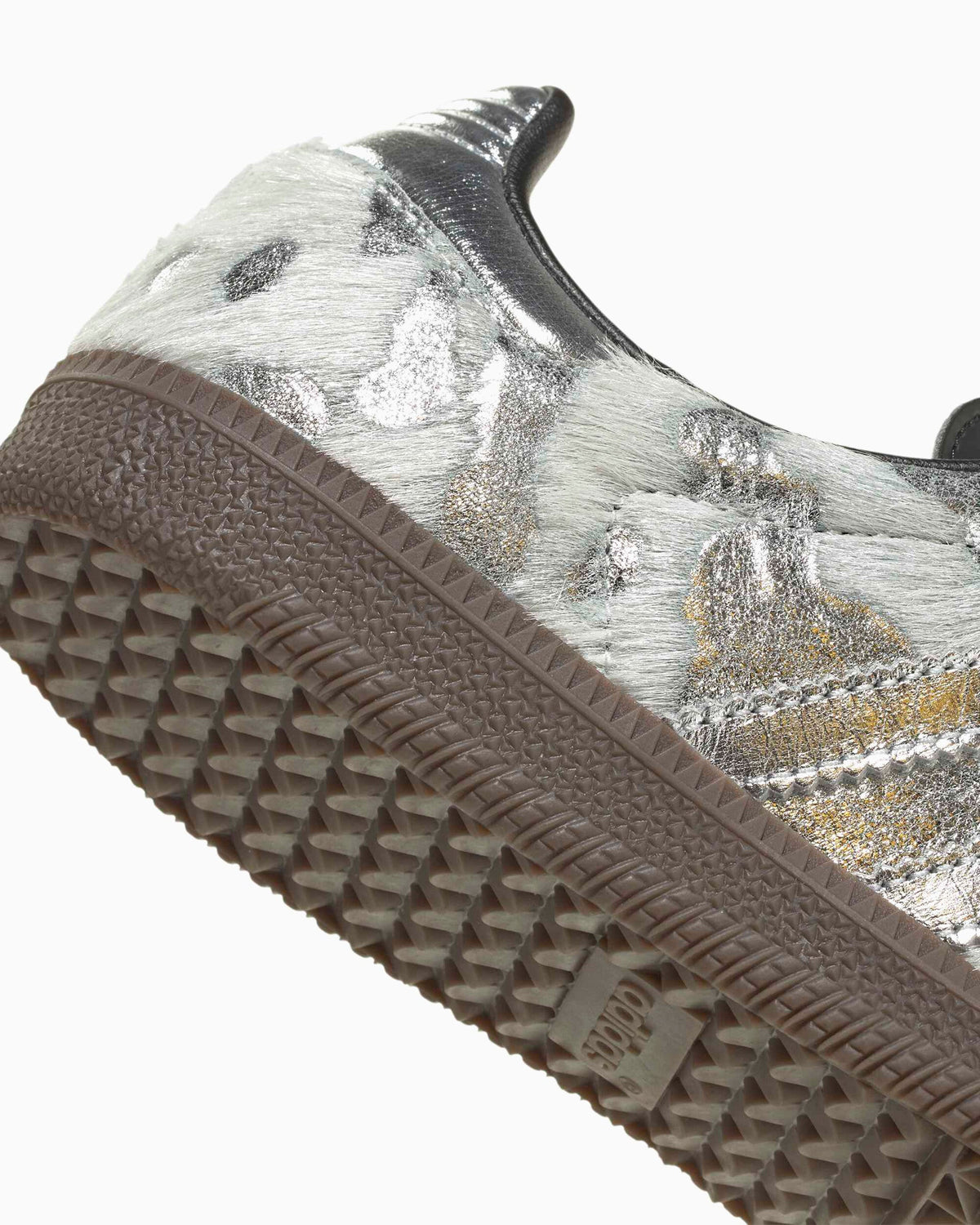 Adidas Samba OG outsole side: textured gum tread with silver pony-hair upper