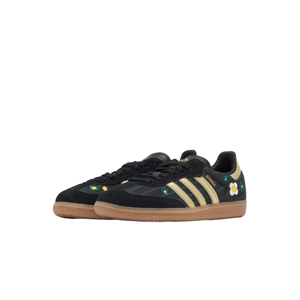 Adidas Samba OG shoes, black with gold stripes and small floral accents, gum sole