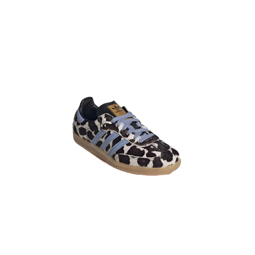 Cow-print low-top sneakers side view, light blue stripes, lace-up, gum sole