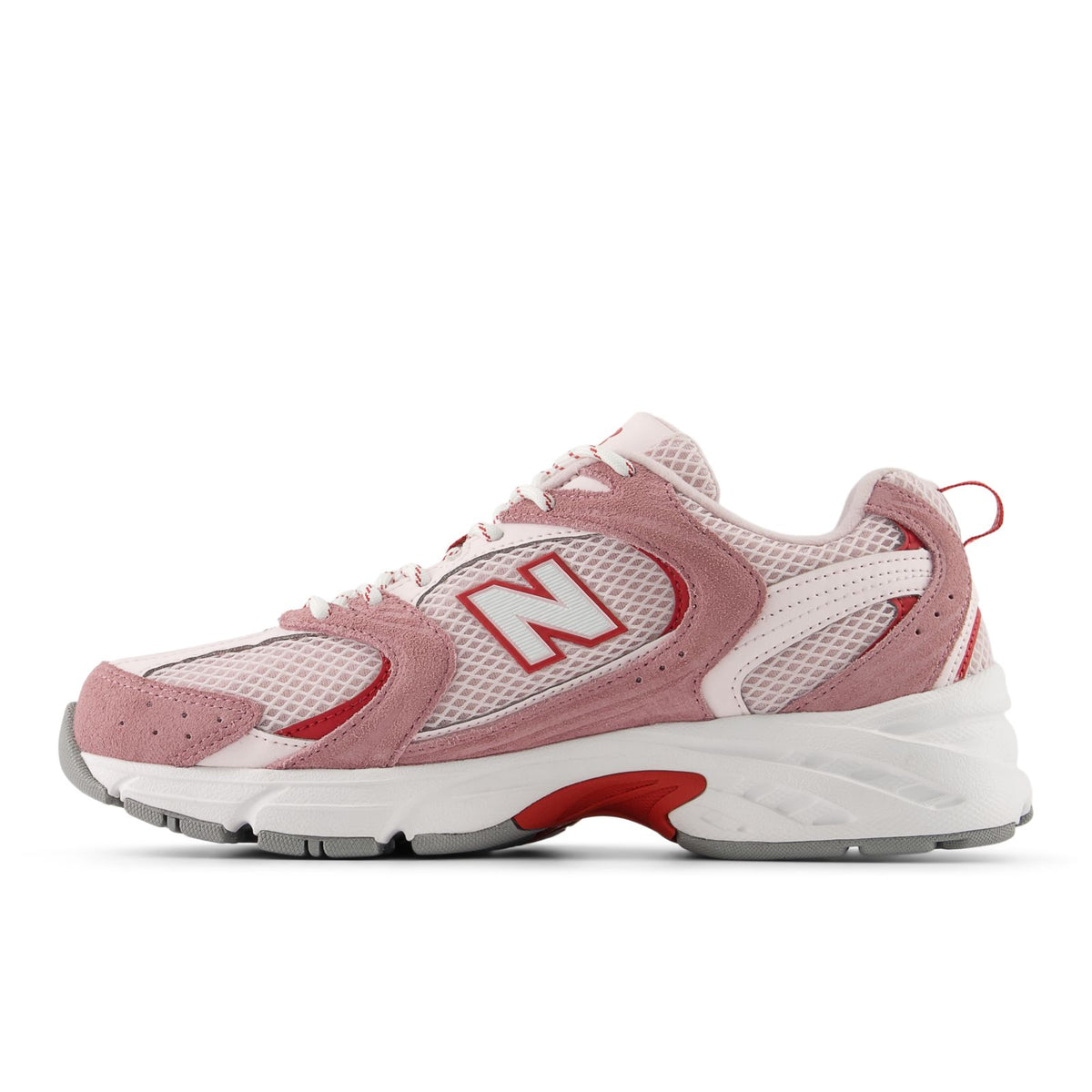 New Balance unisex 530 running shoes, angled side view, rosewood mesh and pink overlays