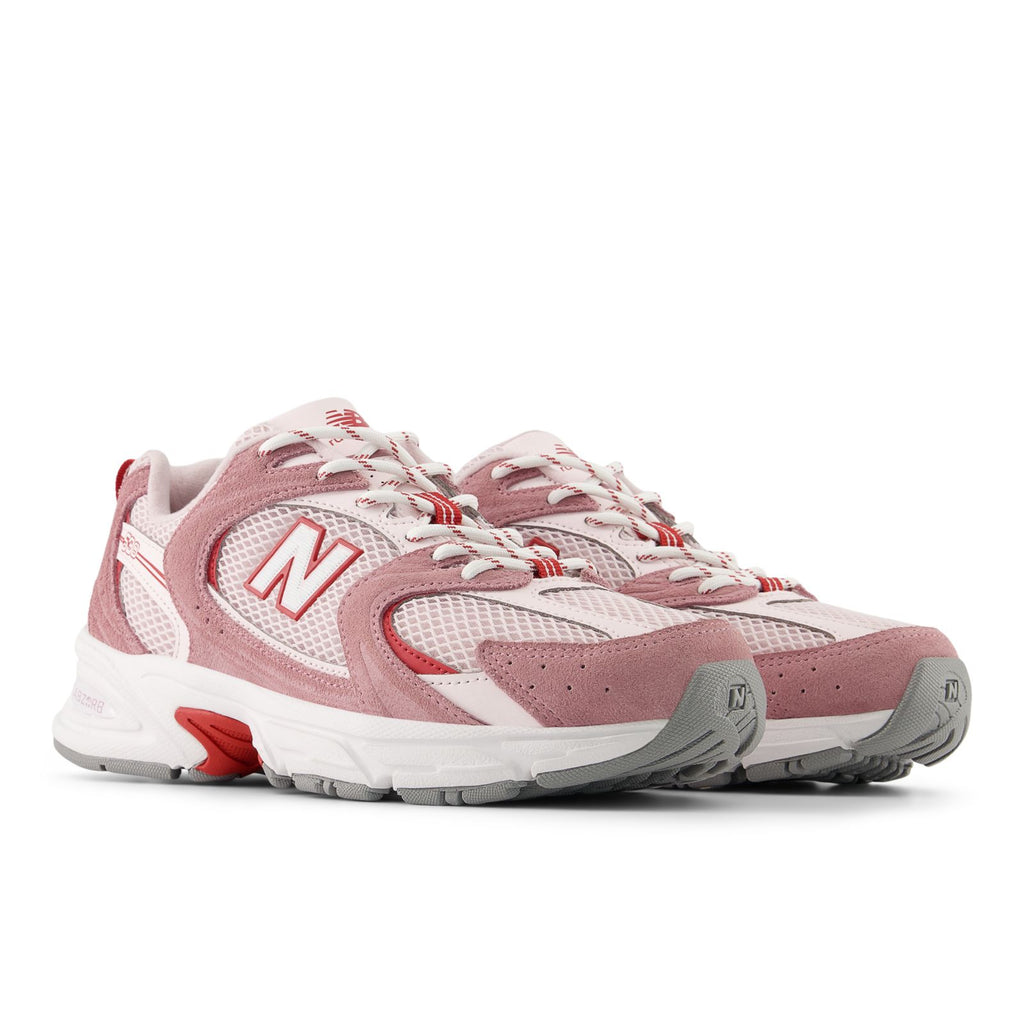 New Balance unisex 530 running shoes, side view, rosewood and pink with red accents