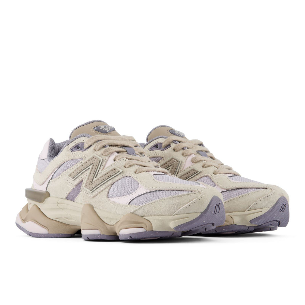 New Balance 9060 unisex sneakers, front three-quarter view with cream and lilac accents