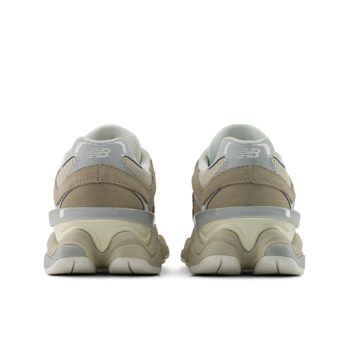 New Balance 9060 unisex sneakers from heel, beige uppers with light blue lining and foam sole