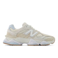 New Balance 9060 running shoes in bisque with light blue accents and chunky white sole