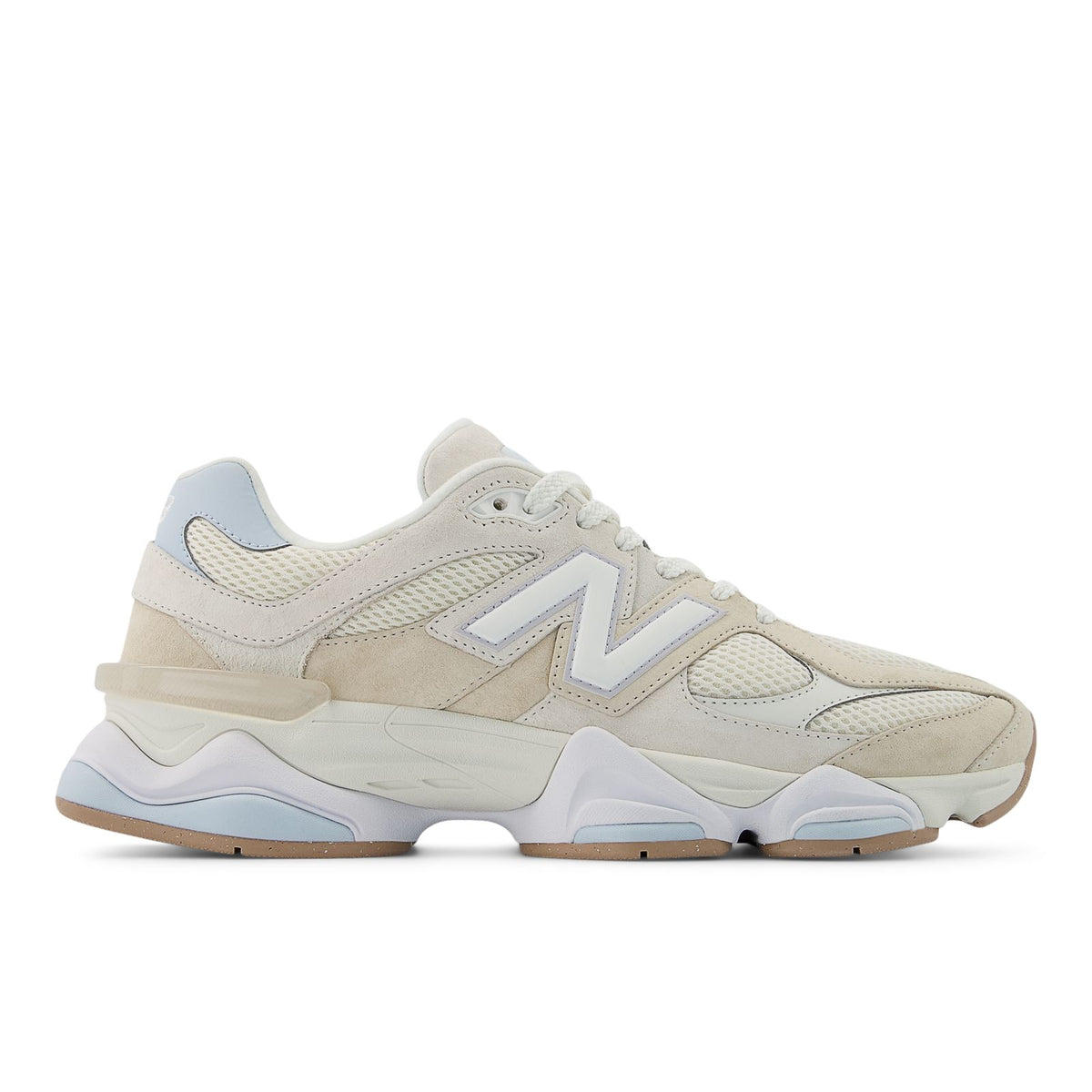 New Balance 9060 running shoes in bisque with light blue accents and chunky white sole