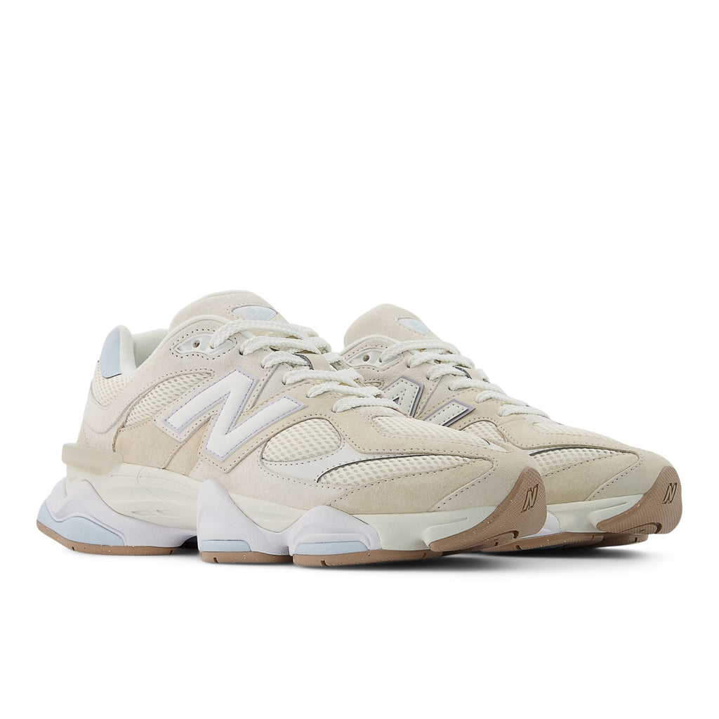 New Balance 9060 sneakers in bisque, lace-up with light blue overlays and sculpted sole