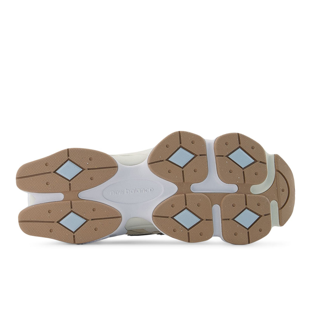 New Balance 9060 shoes outsole view with brown tread and light midsole